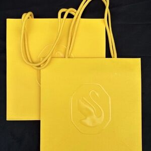 New Swarovski Empty Shopping Paper Gift Bags Set Of 2 Yellow Sz 10.5”x 10.5”x 6”
